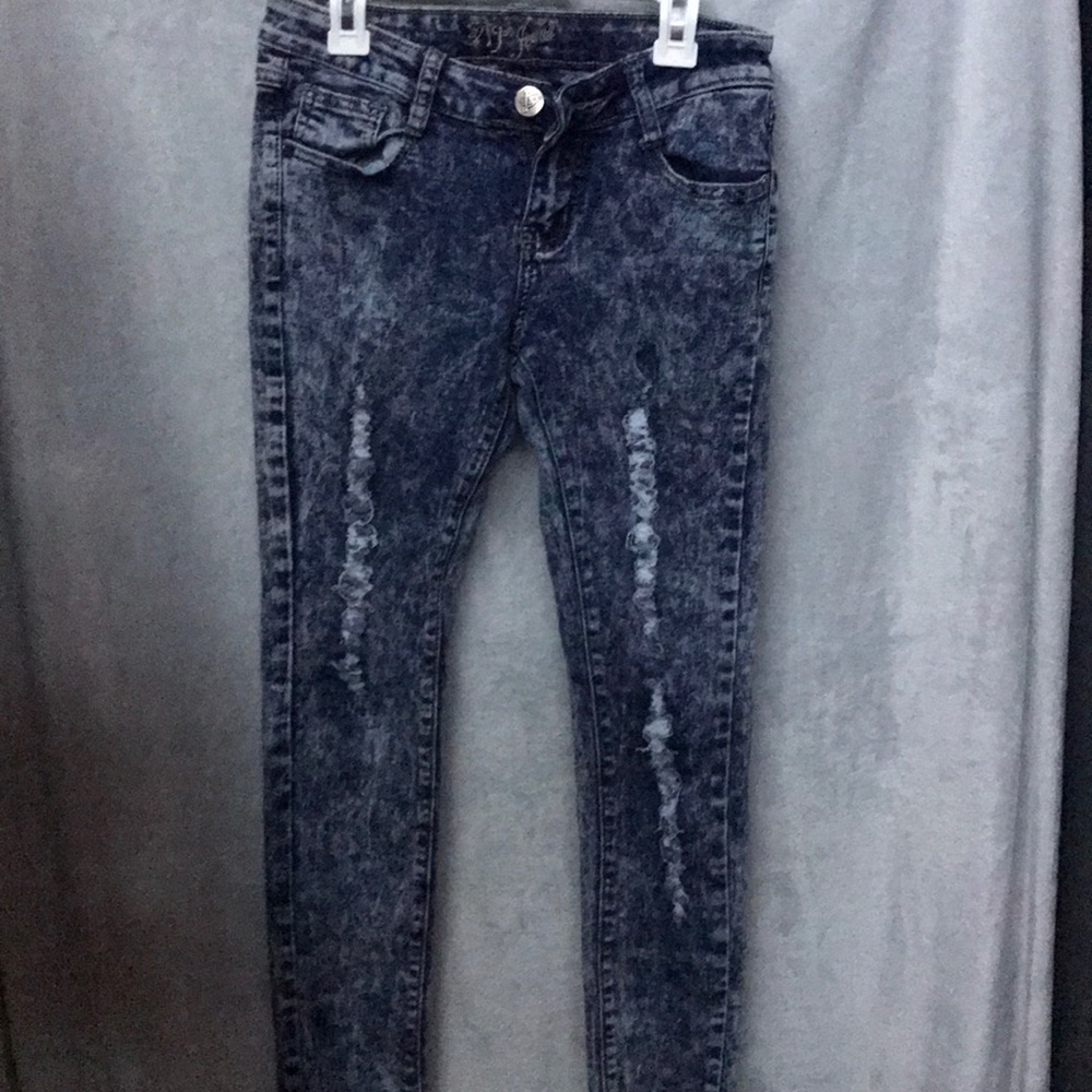 Acid washed distressed jeans